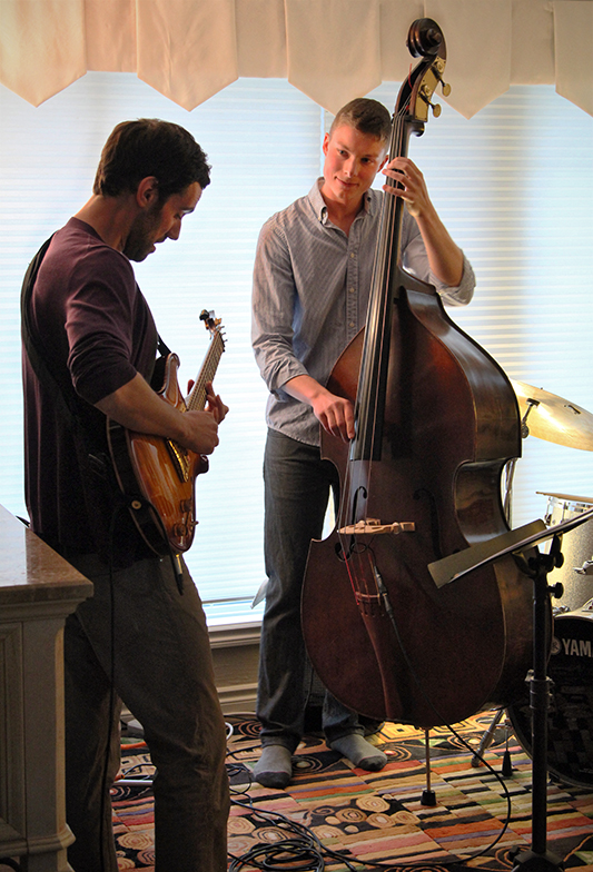 The Soren Nissen, Ian Wright and Nate Renner trio. Nissen looks on and plays bass as Renner gets into another guitar solo. Photo taken Friday, May 17, 2013.